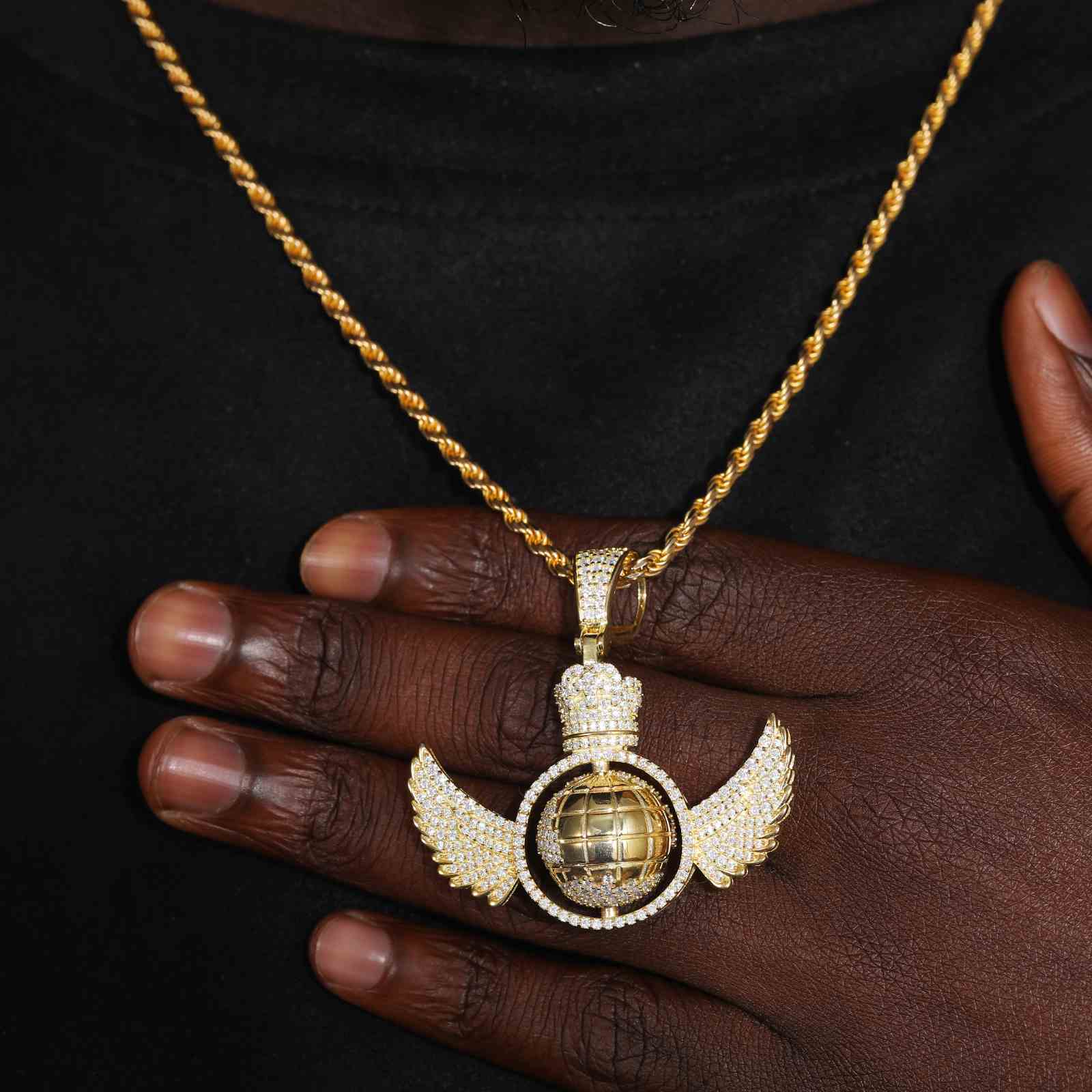 Rotating Globe Wing Pendant