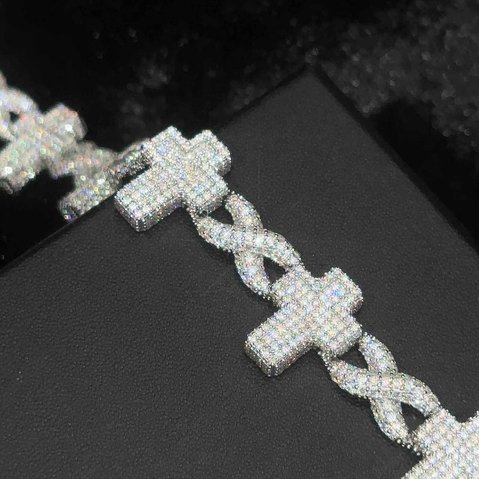close-up-shot-of-a-infinity-cross-bracelet